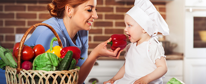mother feeding her child mother feeding her child