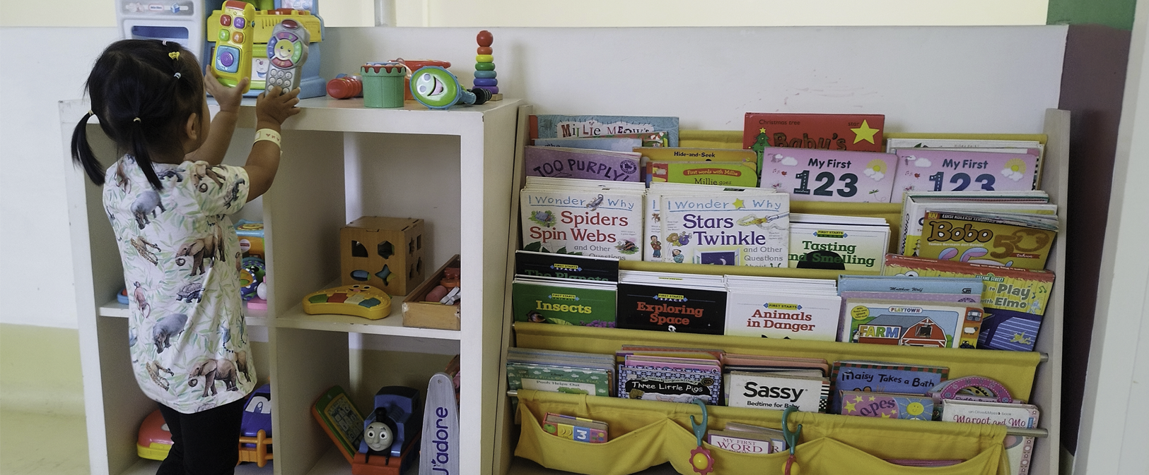 Girl at her home library